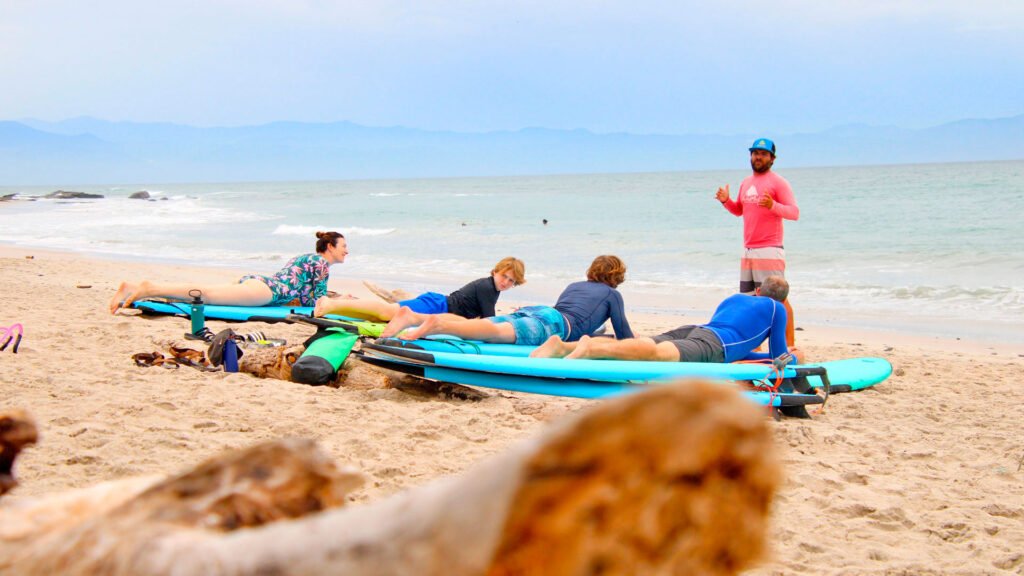 Surf Instructor Job landlesson family 1024x576